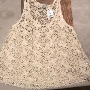 Cream crocheted sleeveless top